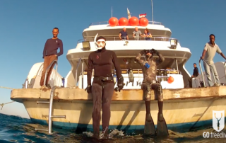 Freediving holiday in the red sea Katherine and Nic on the back of the Whirlwind boat