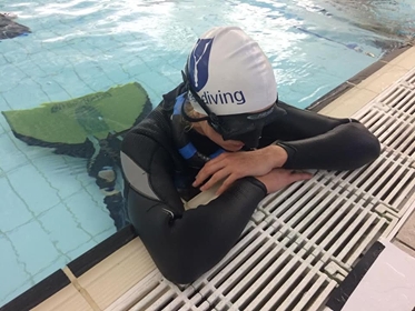 Newbie Zoe Norquoy prepares for her DYN dive