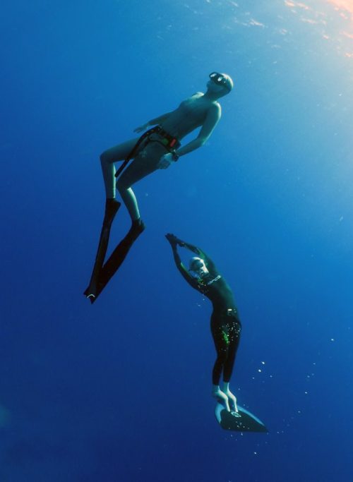 Emma Farrell and freediver in the Red Sea, freediving with a monofin Emma Farrell and freediver in the Red Sea, freediving with a monofin